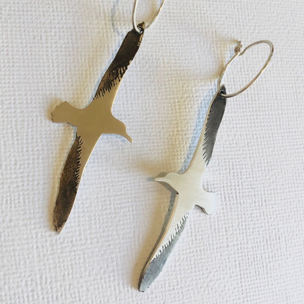 Pair of silver albatross earrings