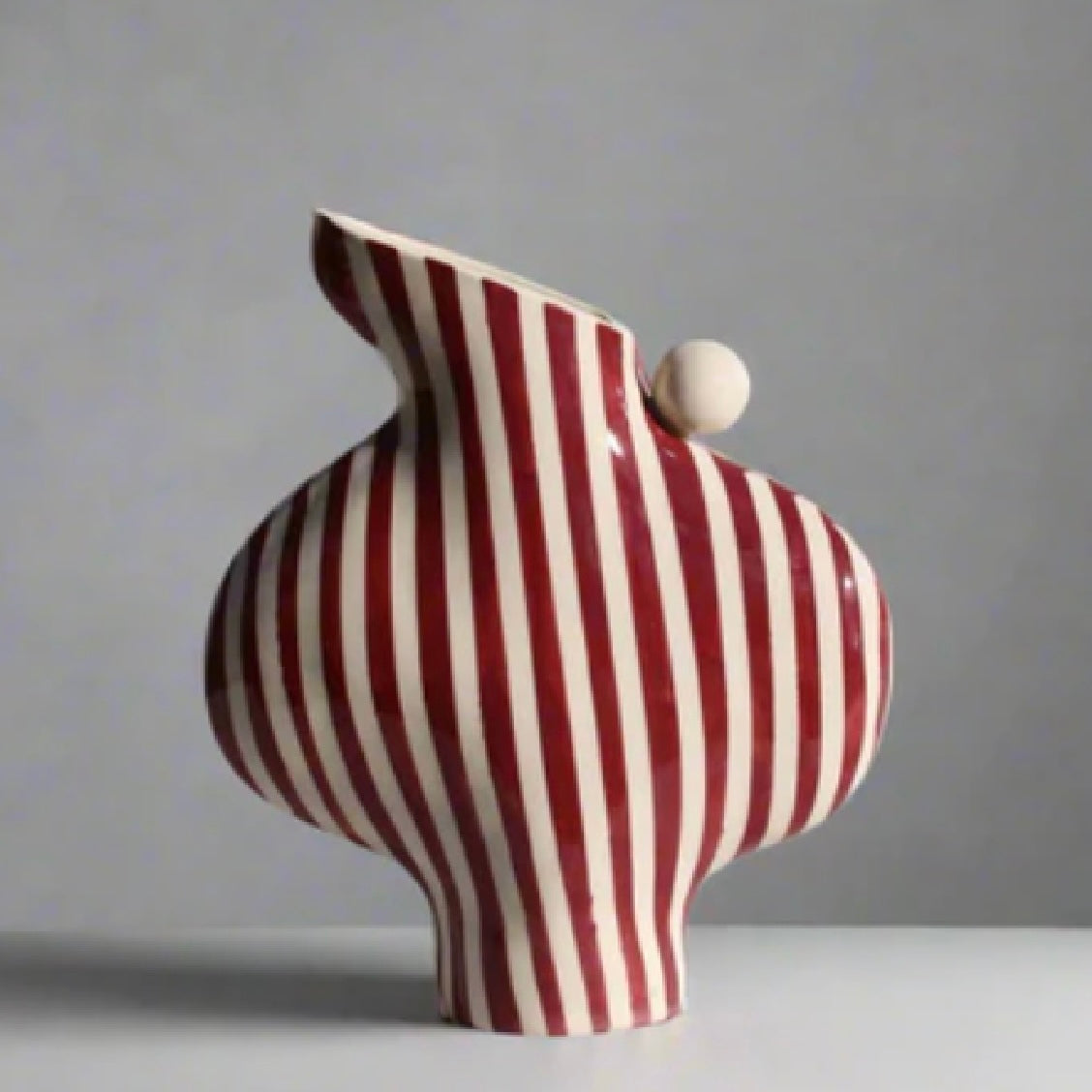 Harlequin orange and pink ceramic jug by Formantics