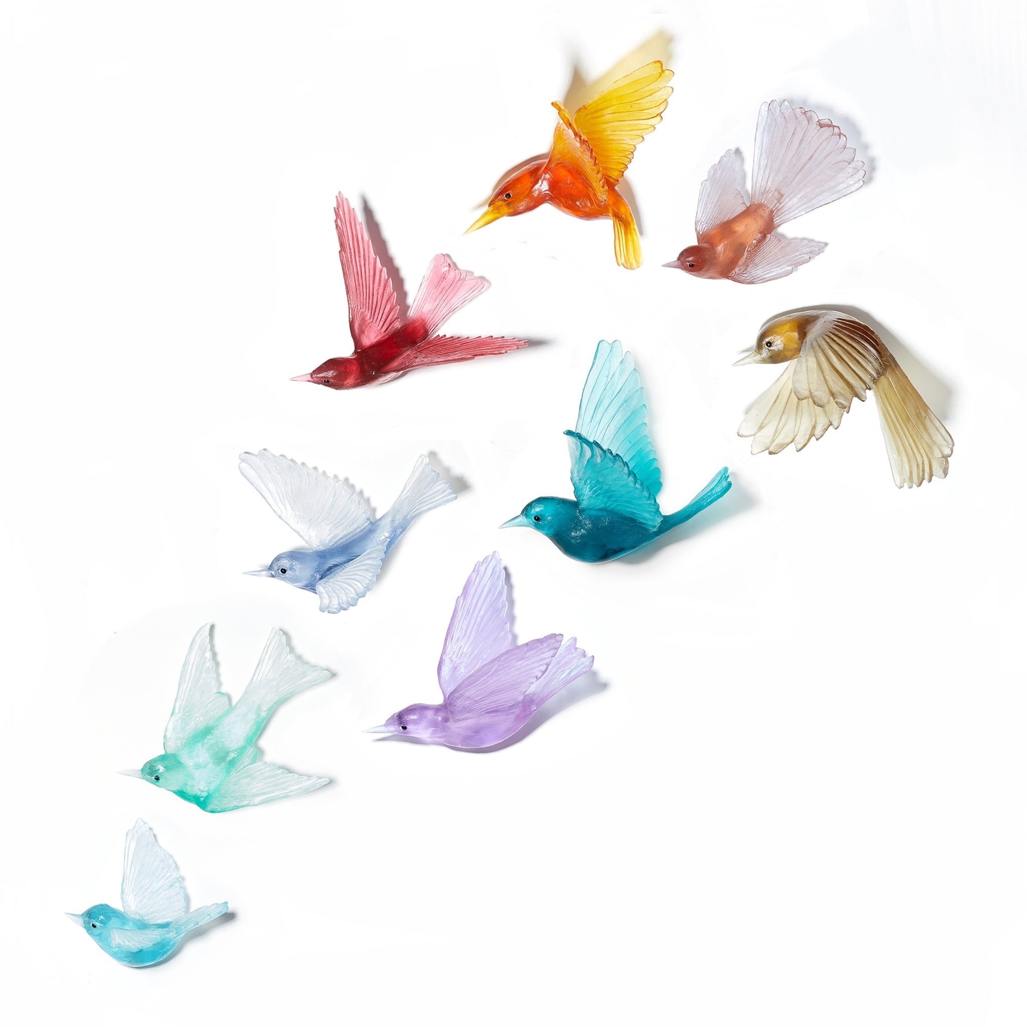 Glass birds in multiple bright colours