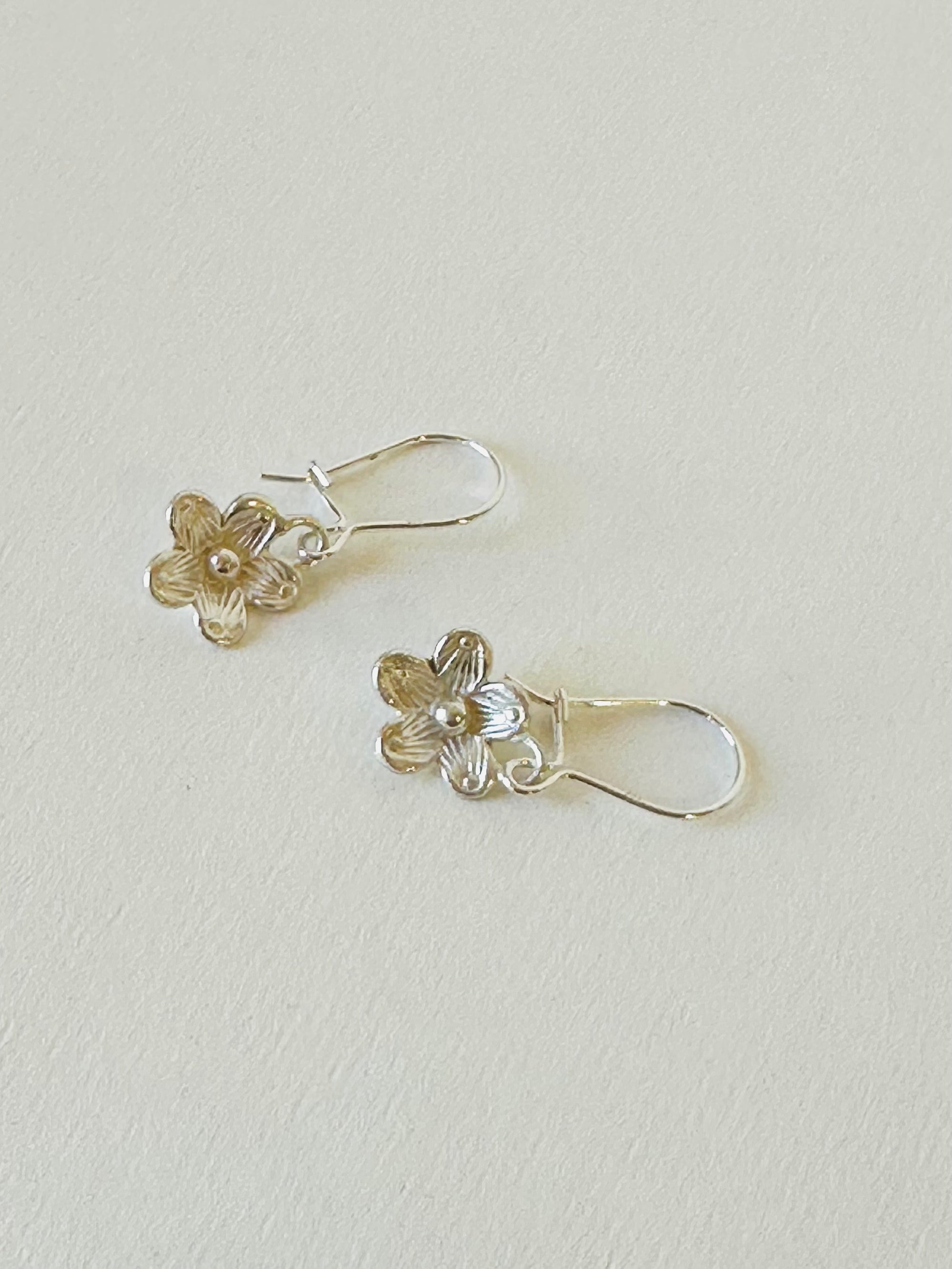 Carved flower sterling silver earrings