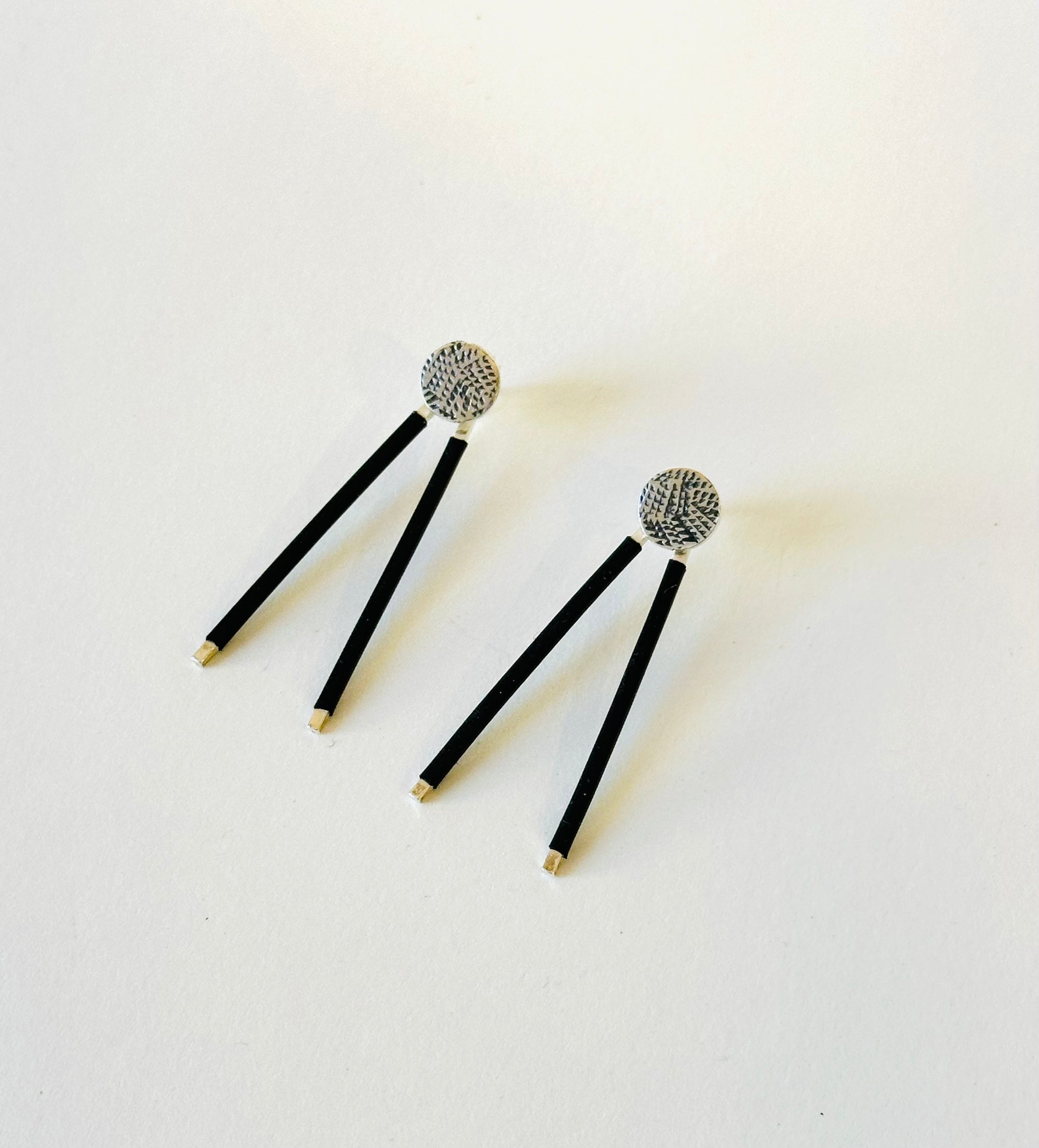 Silver and rubber two way earrings