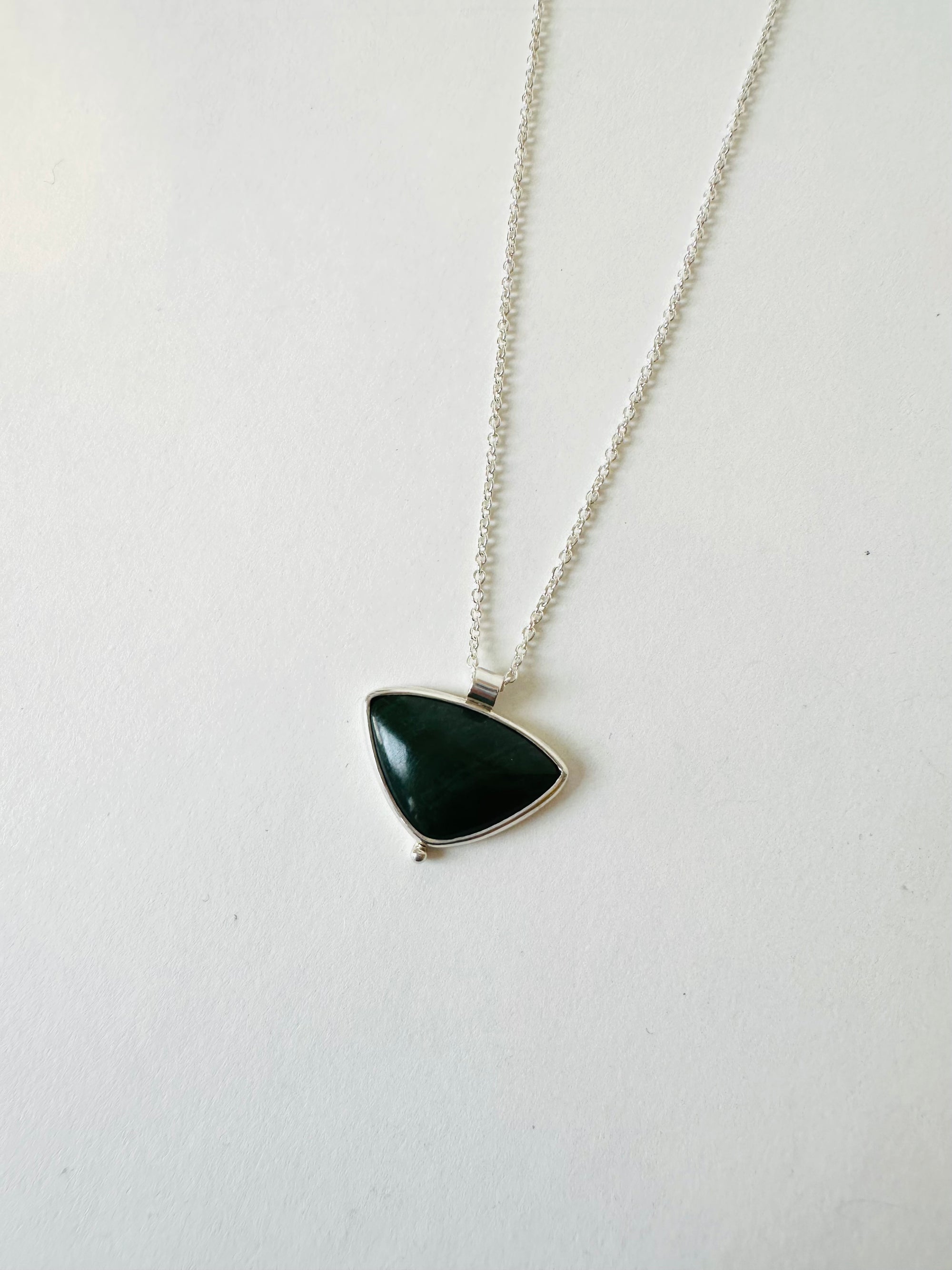 West Coast pounamu and sterling silver pendant necklace