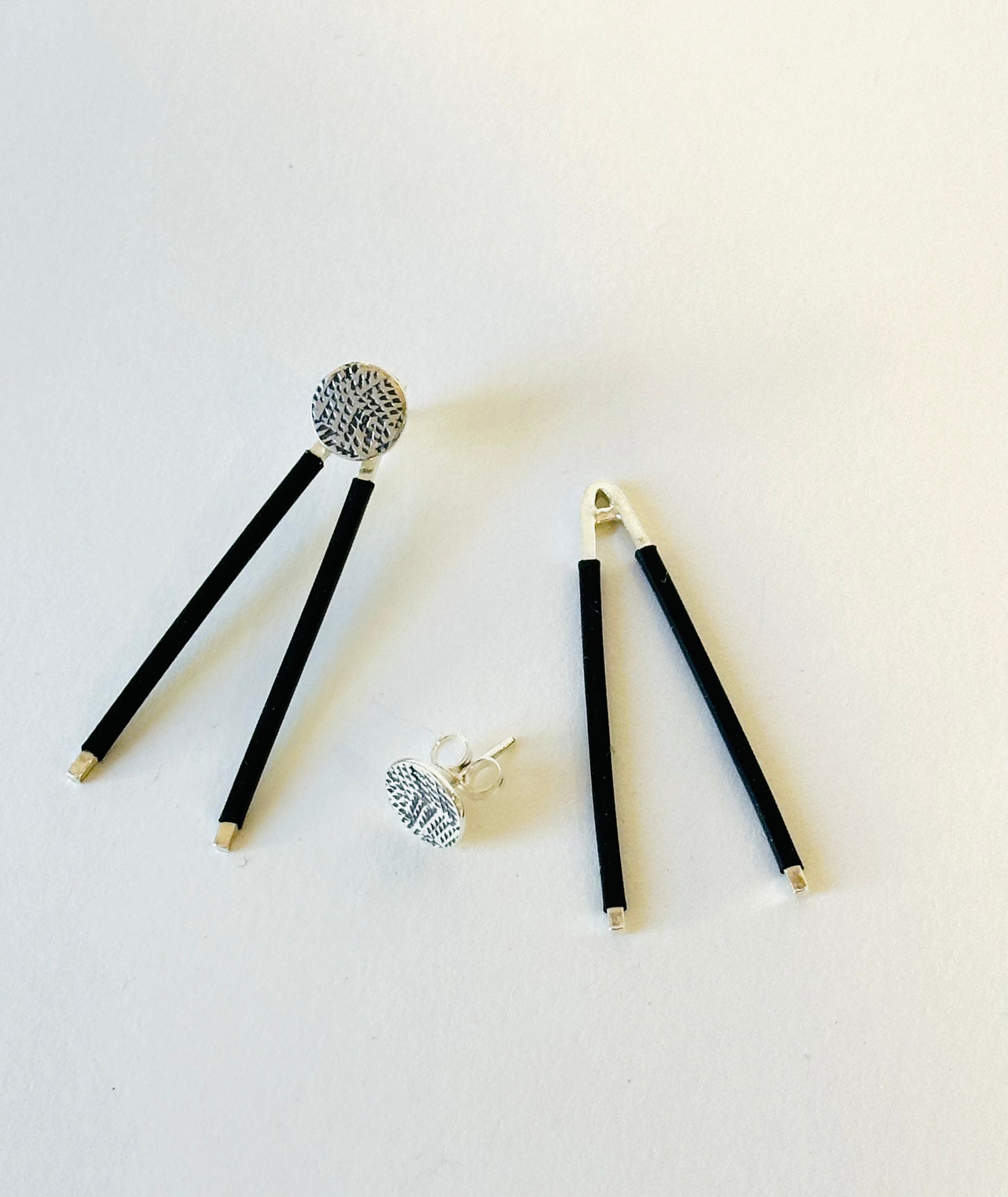 Silver and rubber two way earrings