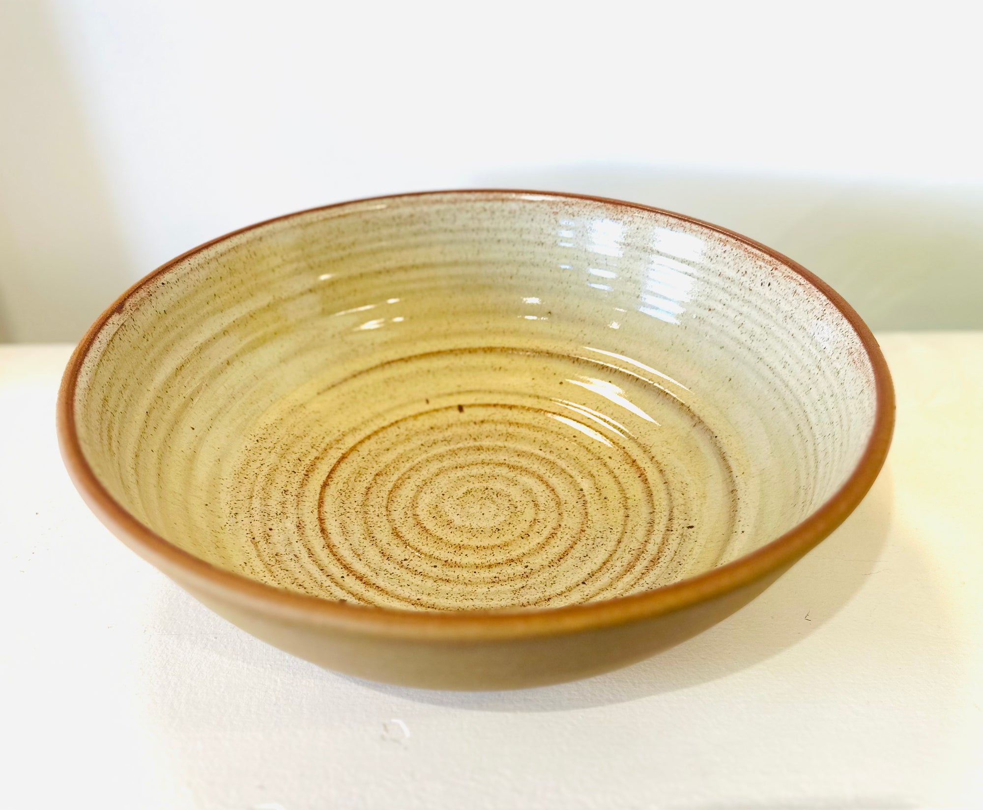 Hand thrown Bowl with yellow glaze