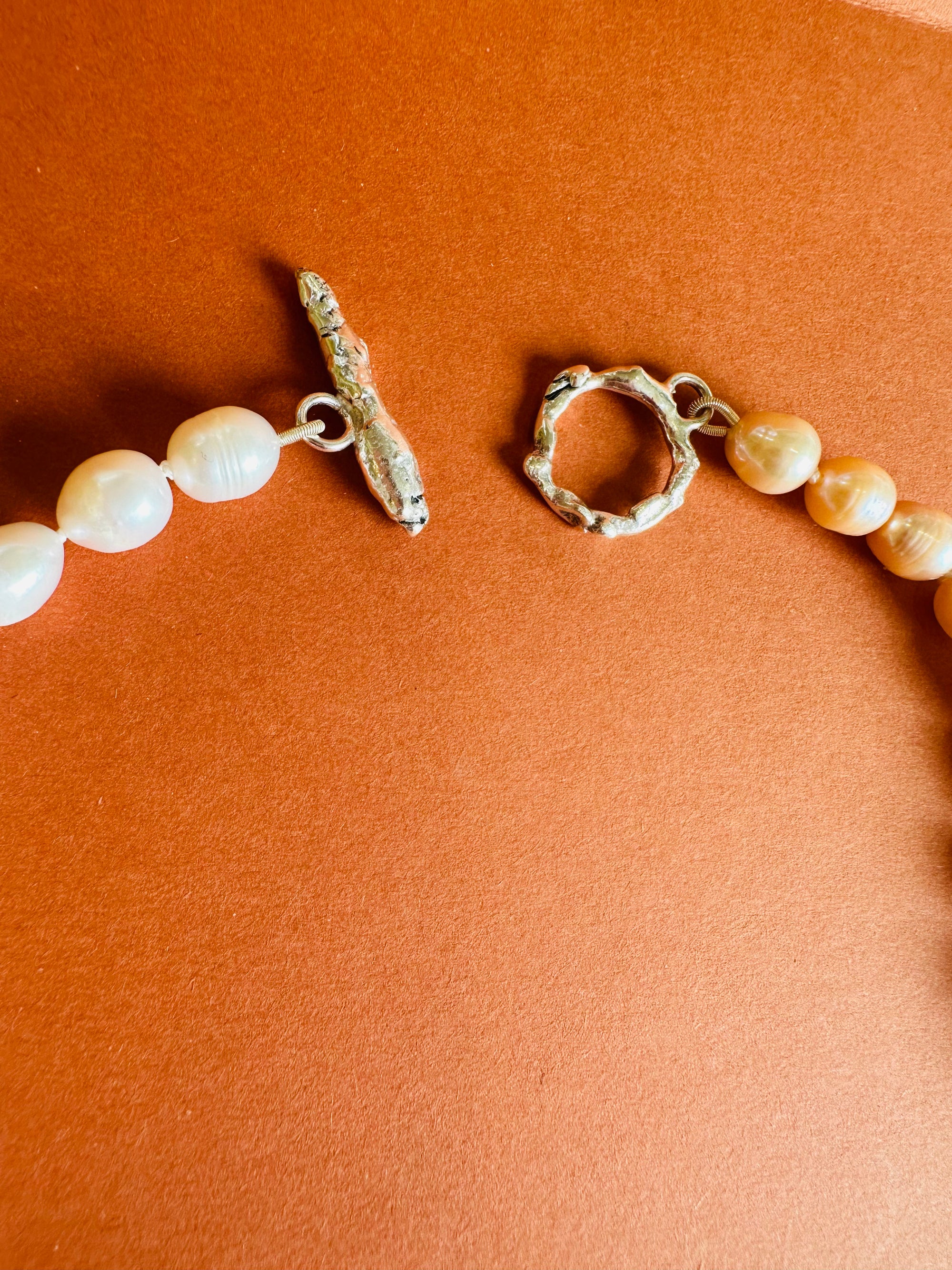 Necklace with freshwater pearls & fused silver clasp.