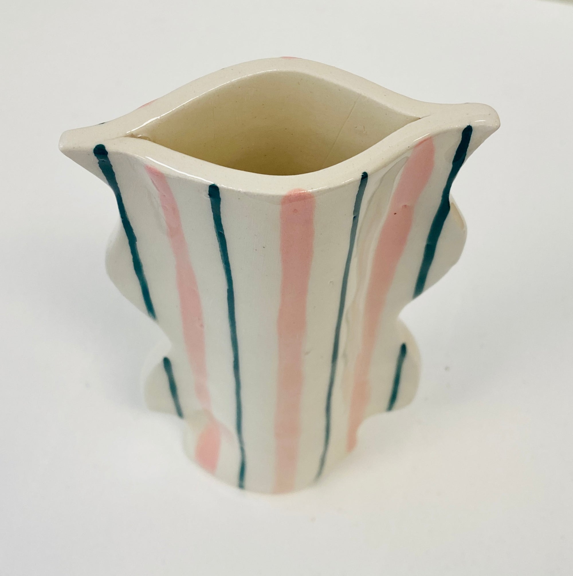 Pink and Green Oscillate Vessel