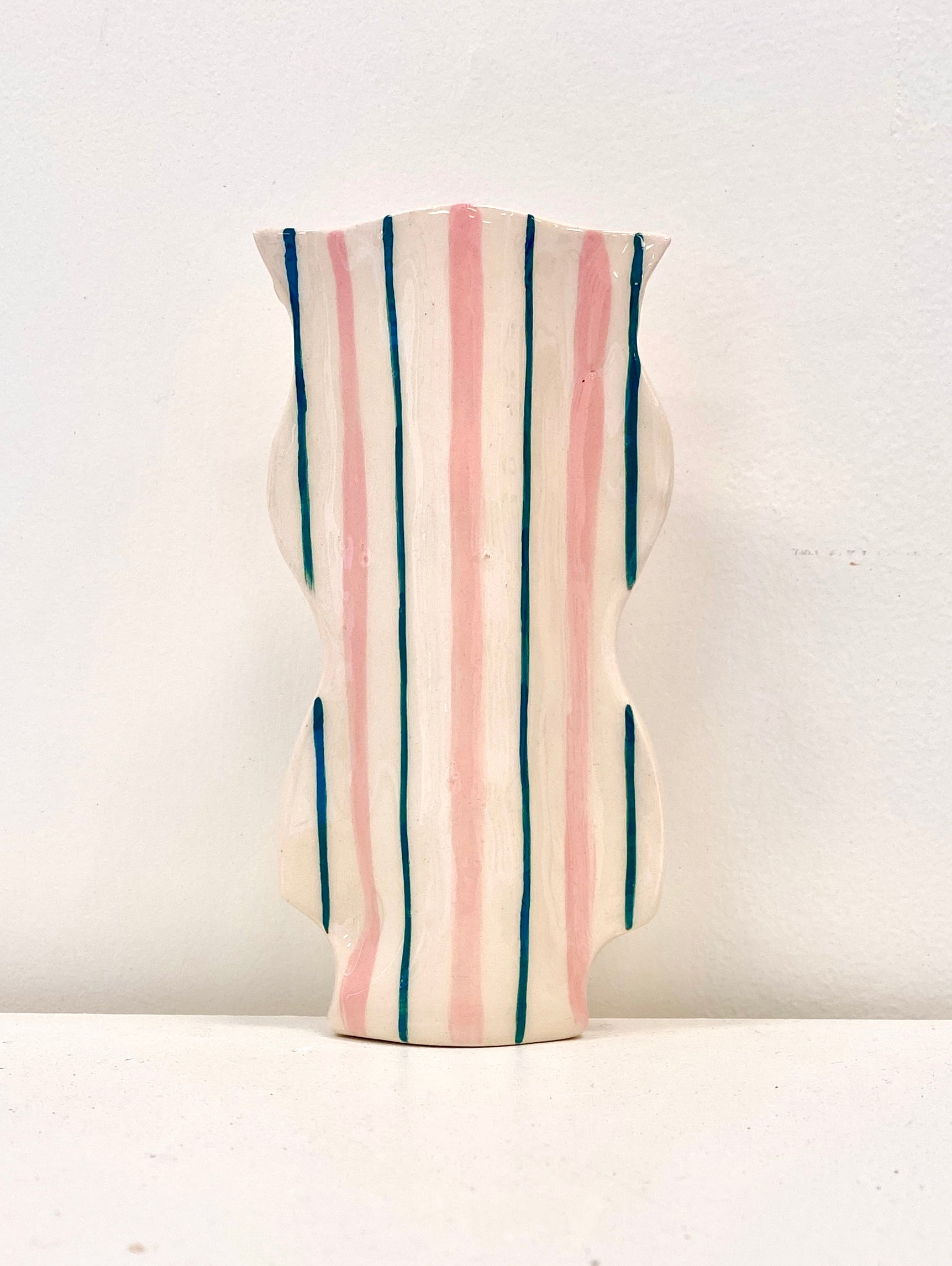 Pink and Green Oscillate Vessel