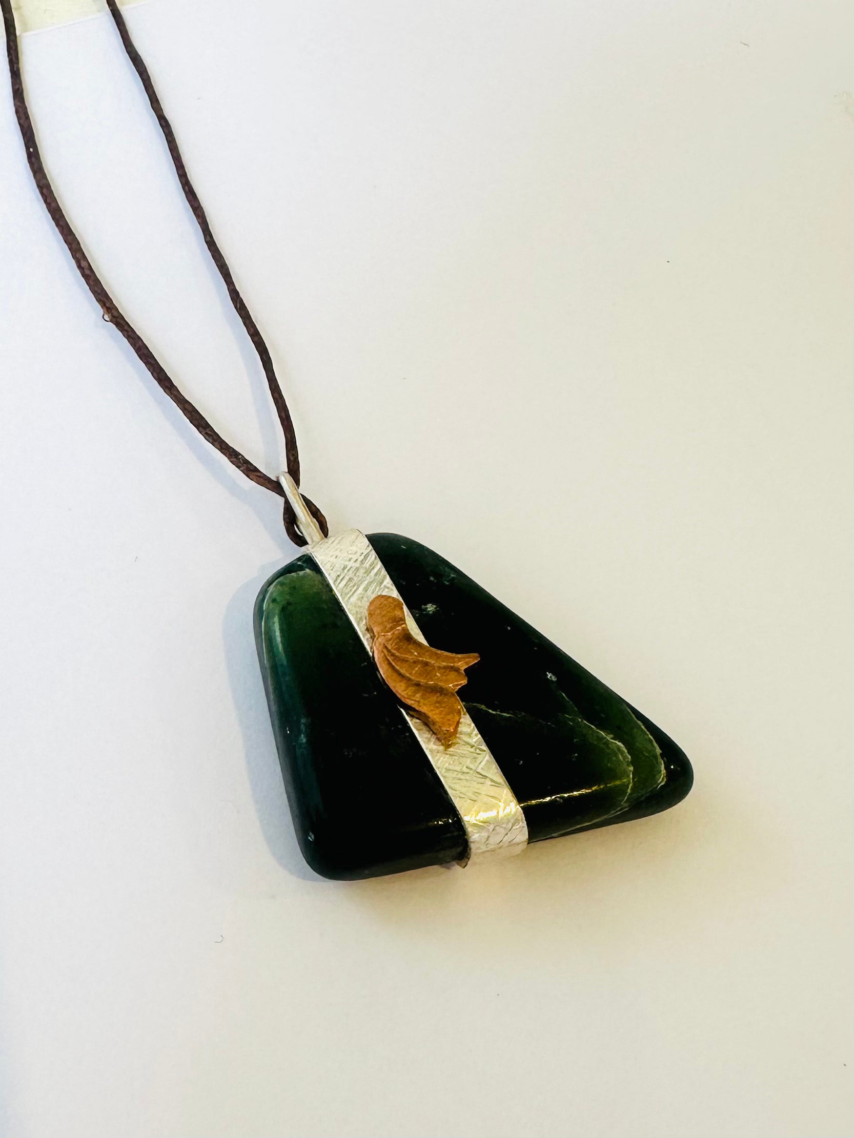 Down to Earth Pounamu necklace on thread