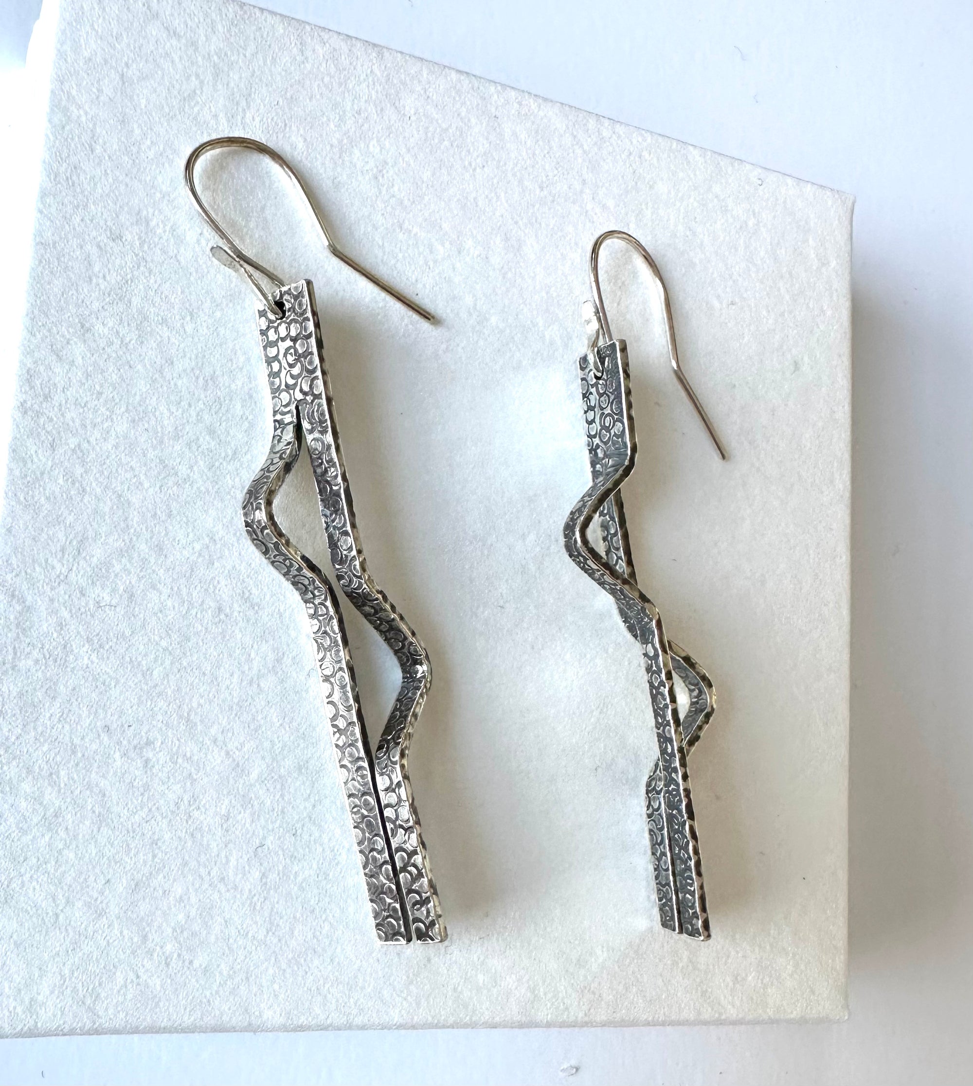 Silver triangle bent Prong on hoop Earrings