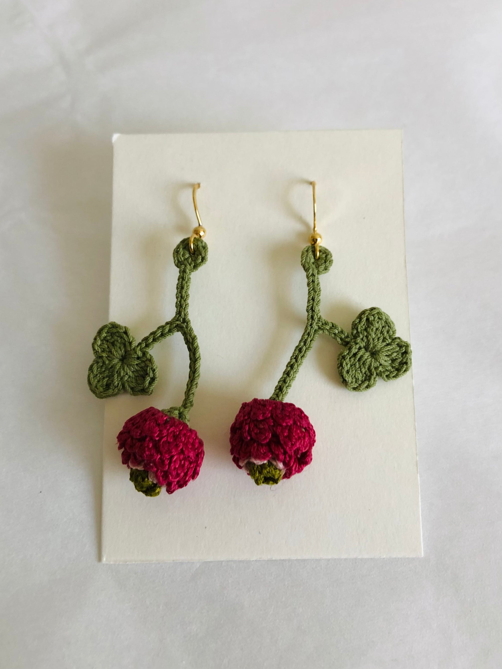 Hand crocheted peony bud earrings